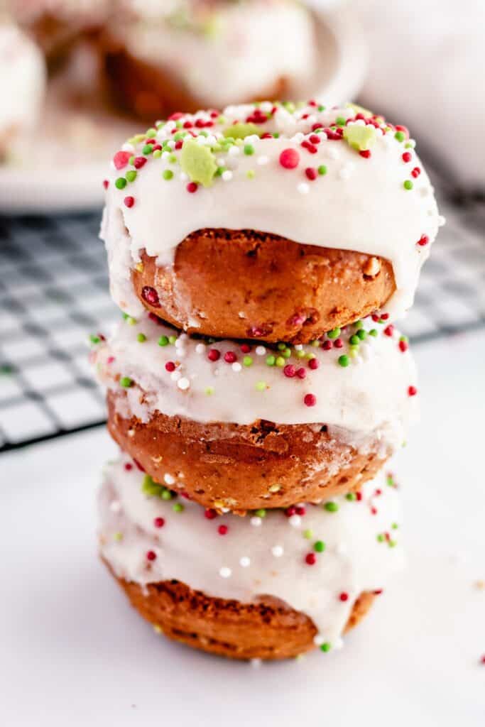 doughnuts stacked on each other with christmas sprinkles