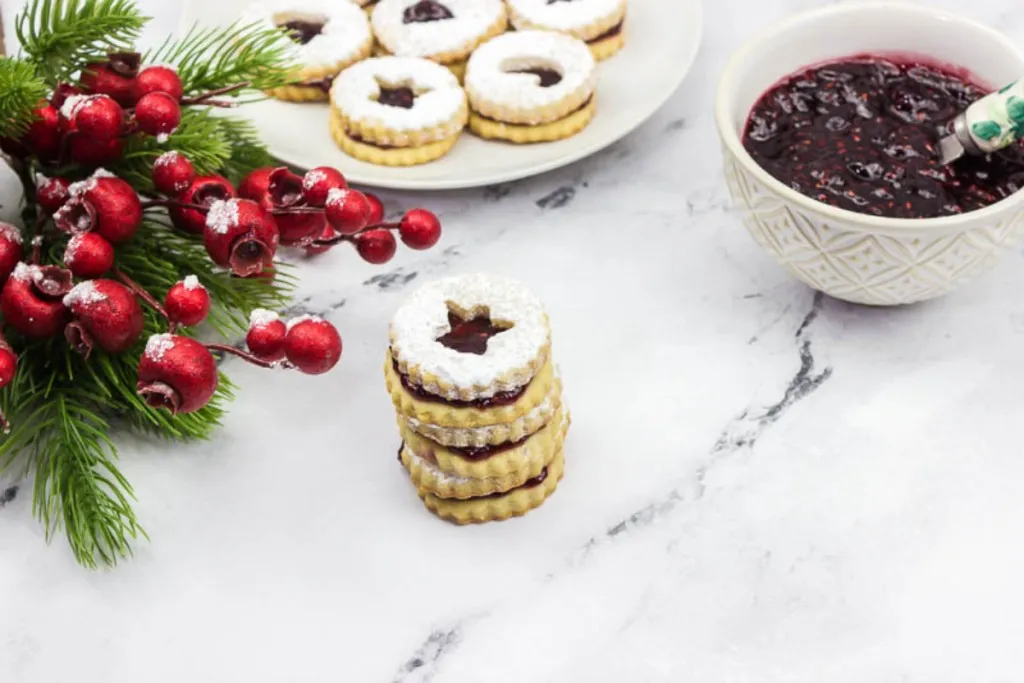 shot of beautiful christmas butter cookies and jam