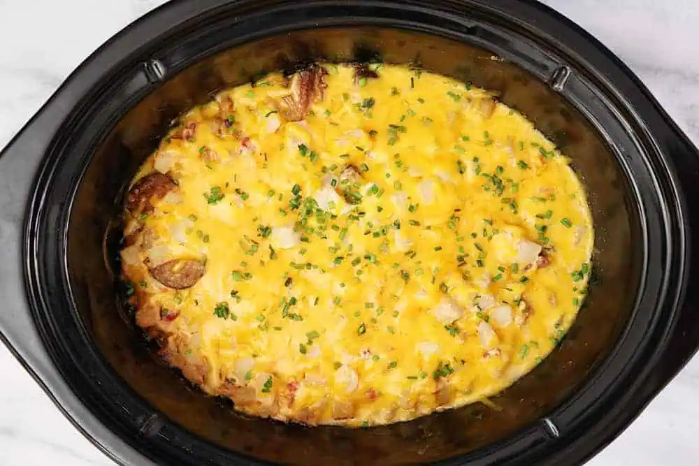 cheesy potatoes covered with cheddar melted on top with diced chives