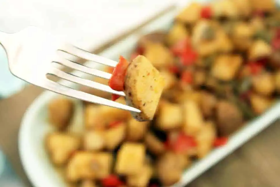 slow cooker country style potatoes on a fork