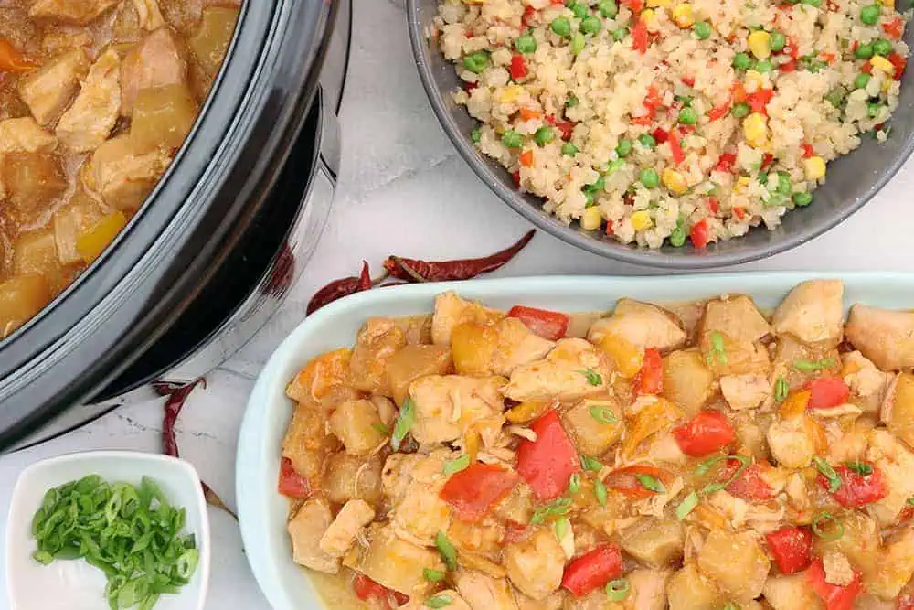 slow cooker pineapple chicken next to crockpot with cauliflower stir fry