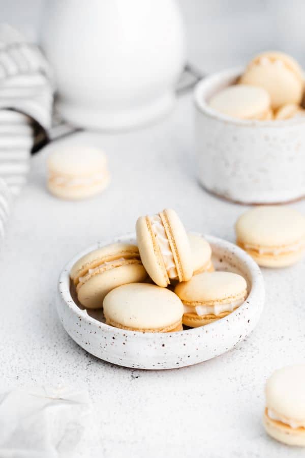 a bowl of the best macarons recipe in a flat white stone bowl