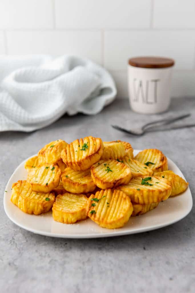 EASY AIR FRYER POTATOES RECIPE ON A WHITE PLATE