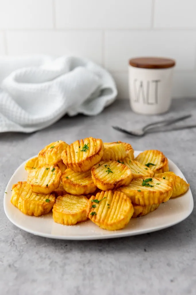 EASY AIR FRYER POTATOES RECIPE ON A WHITE PLATE