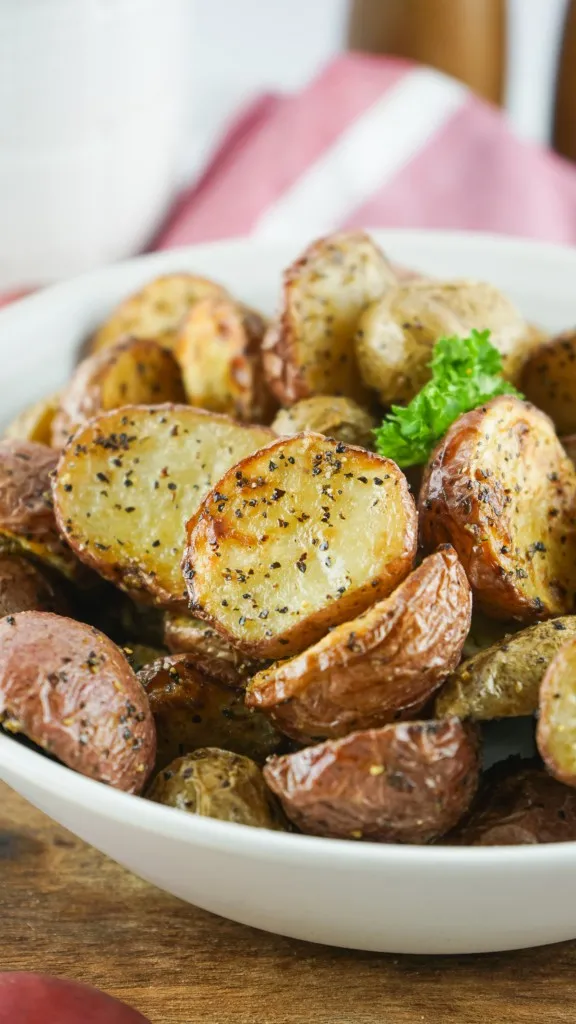 a white ceramic bowl air fryer roasted potatoes