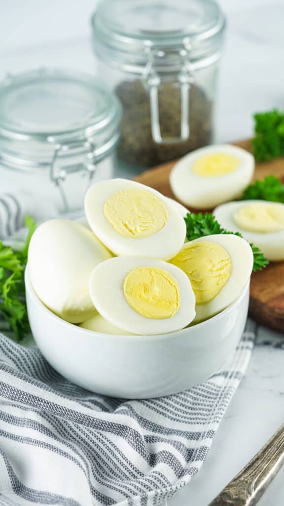salt and pepper containers with sliced hard boiled eggs