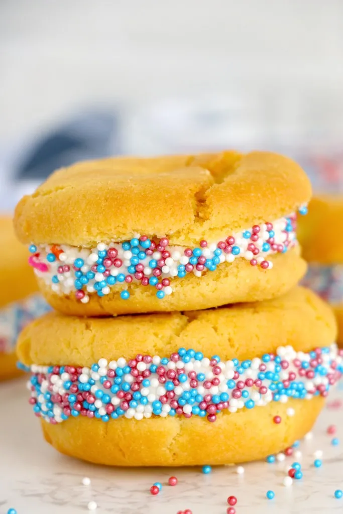 air fryer sugar cookies stacked on each other with mini sugar beads
