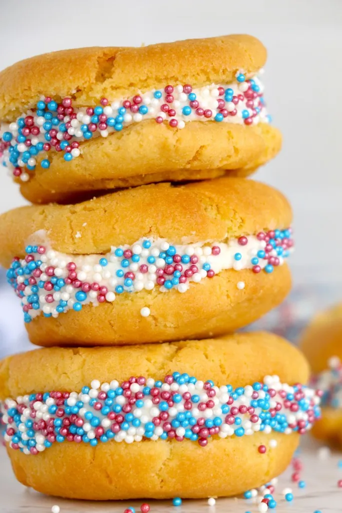 Close up of three stacked air fryer sugar cookie whoopie pies.