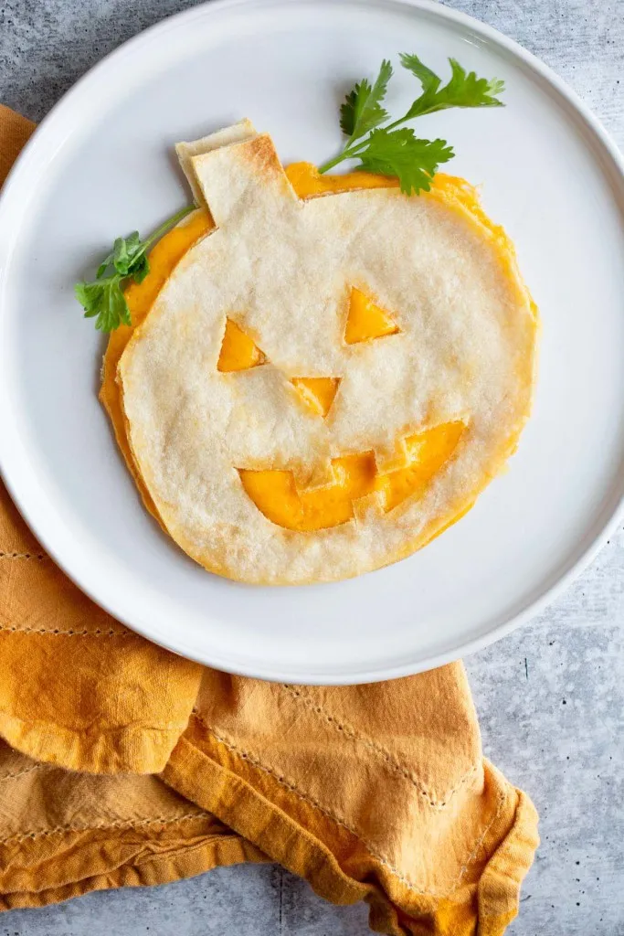 pumpkin quesdailla that was made in an air fryer that will be a halloween delight for kids