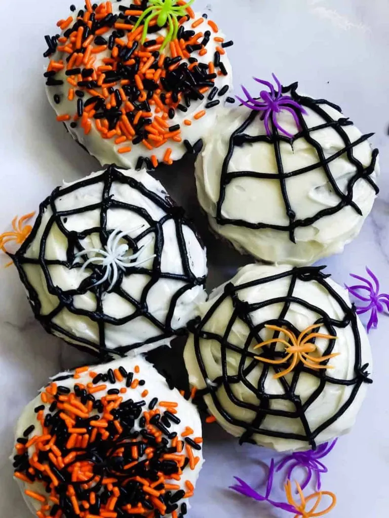 pre-made doughts that you can ice with sprinkles, spider webs, and spiders