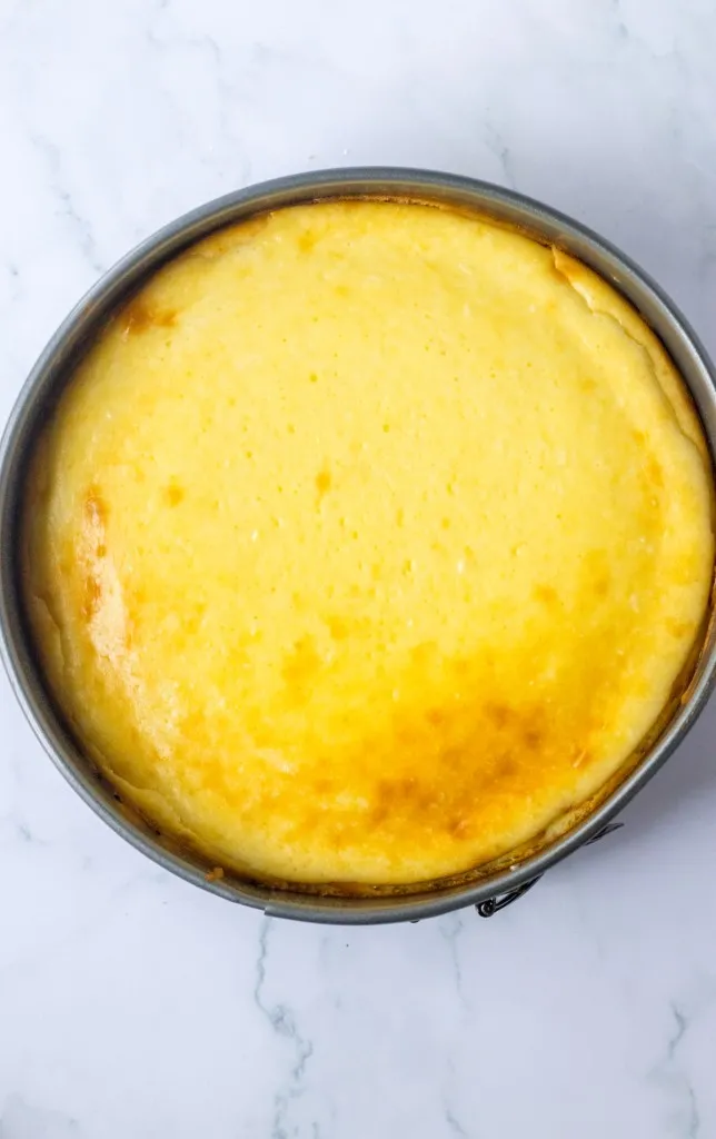 Overhead view of baked Twix cheesecake without any toppings added.