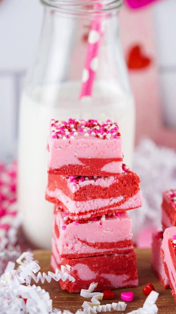 red and pink valentines day fudge stacked on top of each other