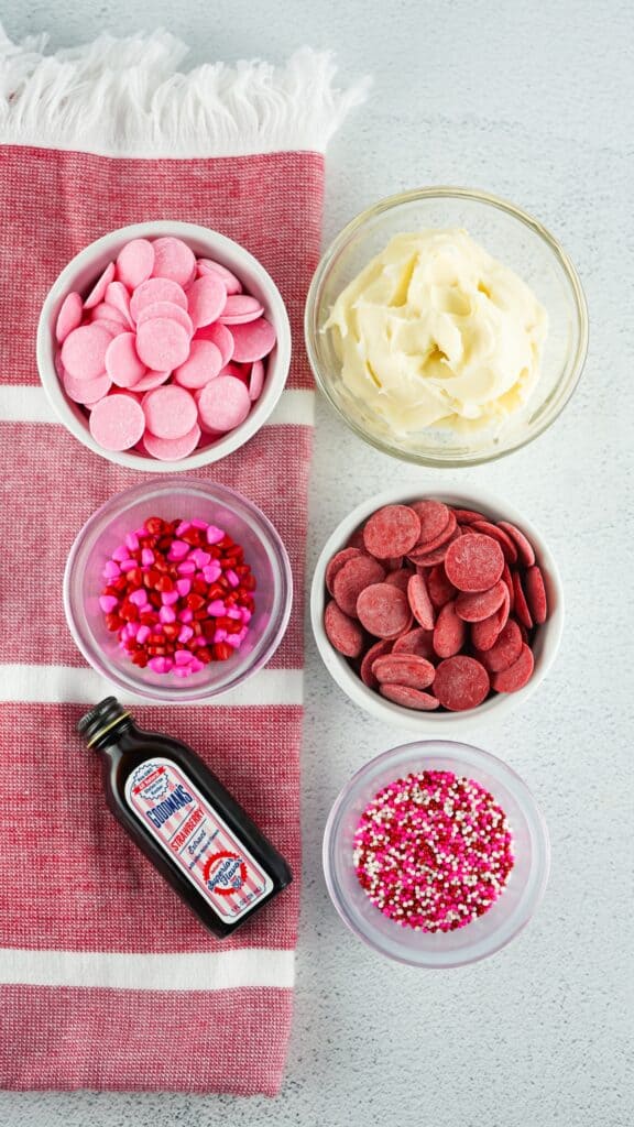 Overhead shot of Valentine's fudge ingredients on a white countertop.