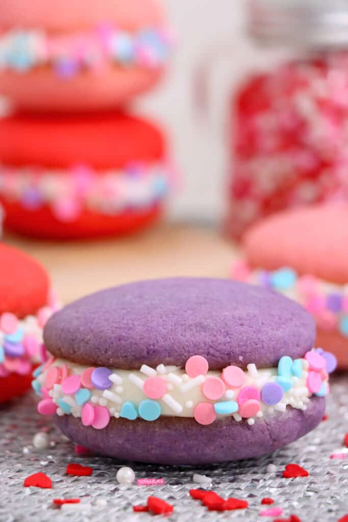 Close up of a Valentine's whoopie pie with other whoopie pies in the background.