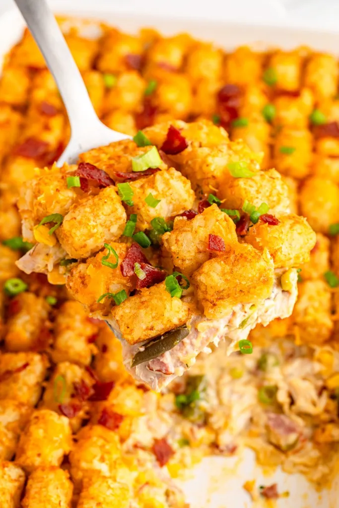 Golden‑brown Chicken Tater Tot Casserole fresh from the oven in a white 9×13 dish.