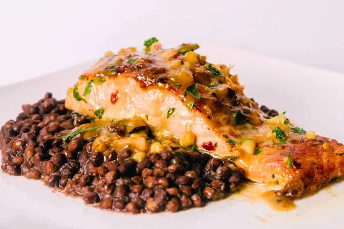 Cast iron skillet salmon on a plate.