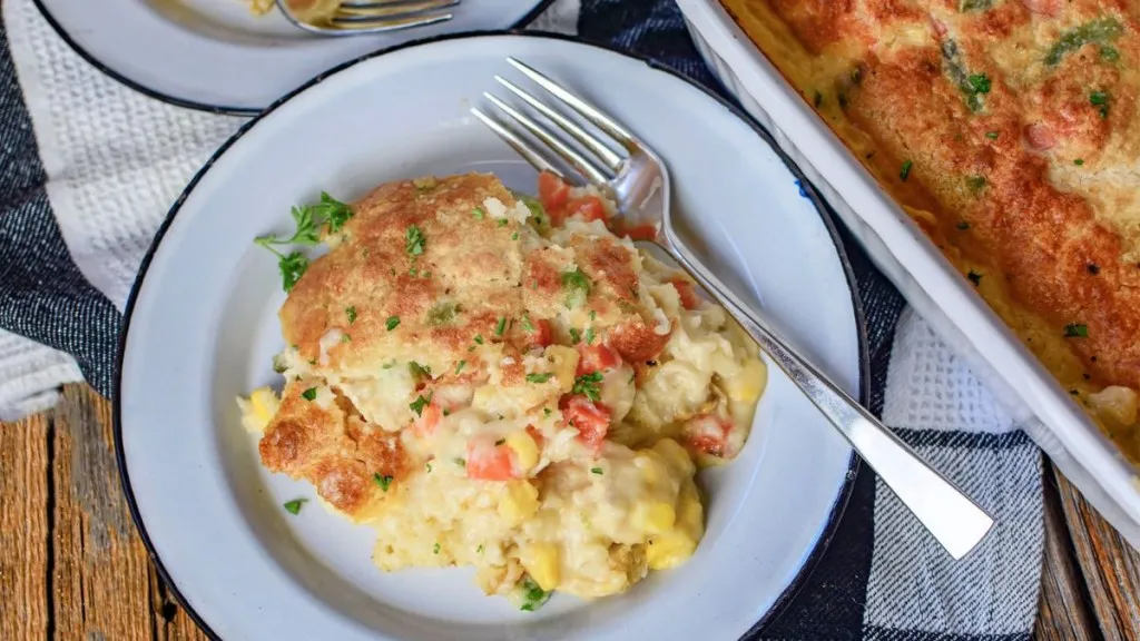a plate of pot pie made of leftover turkey and cheddar bay biscuits.