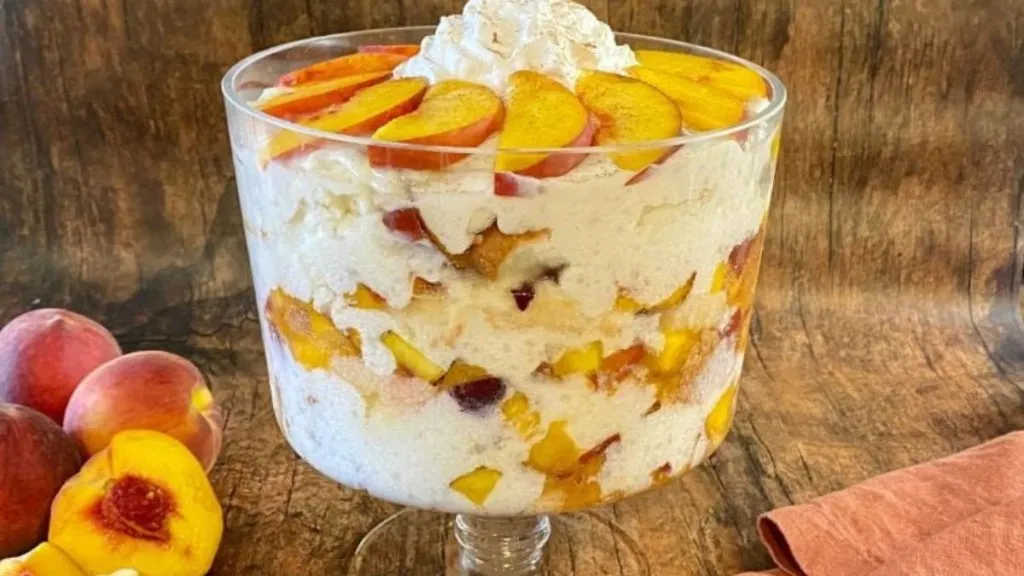 A trifle made of peaches, cream and angel food cake.