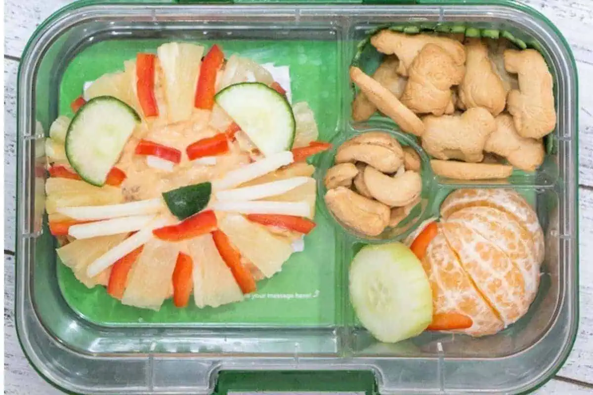 Pita, hummus, Red pepper and fruit in a bento box