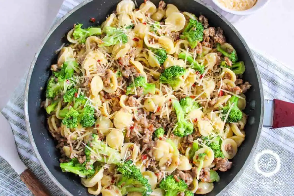 Sausage and broccoli pasta in a bowl.