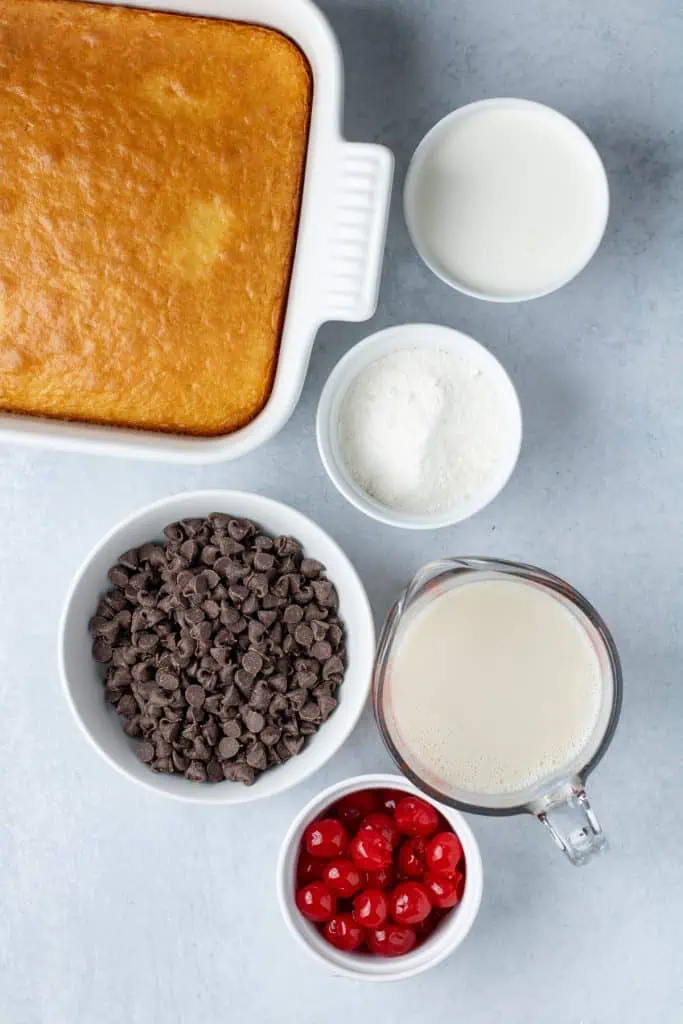 All the easy ingredients needed to make a boston cream poke cake